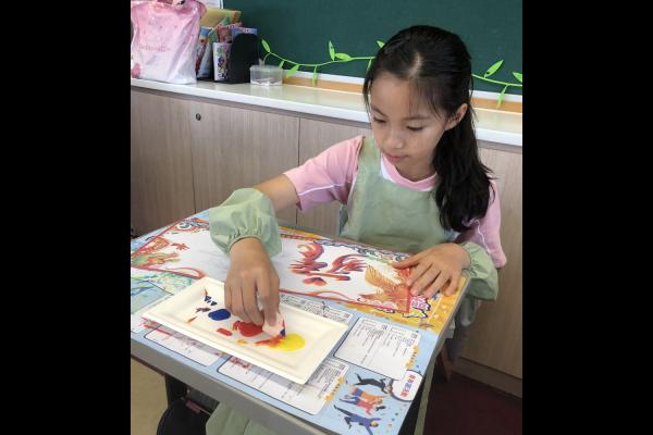 四年級《龍鳳書法》